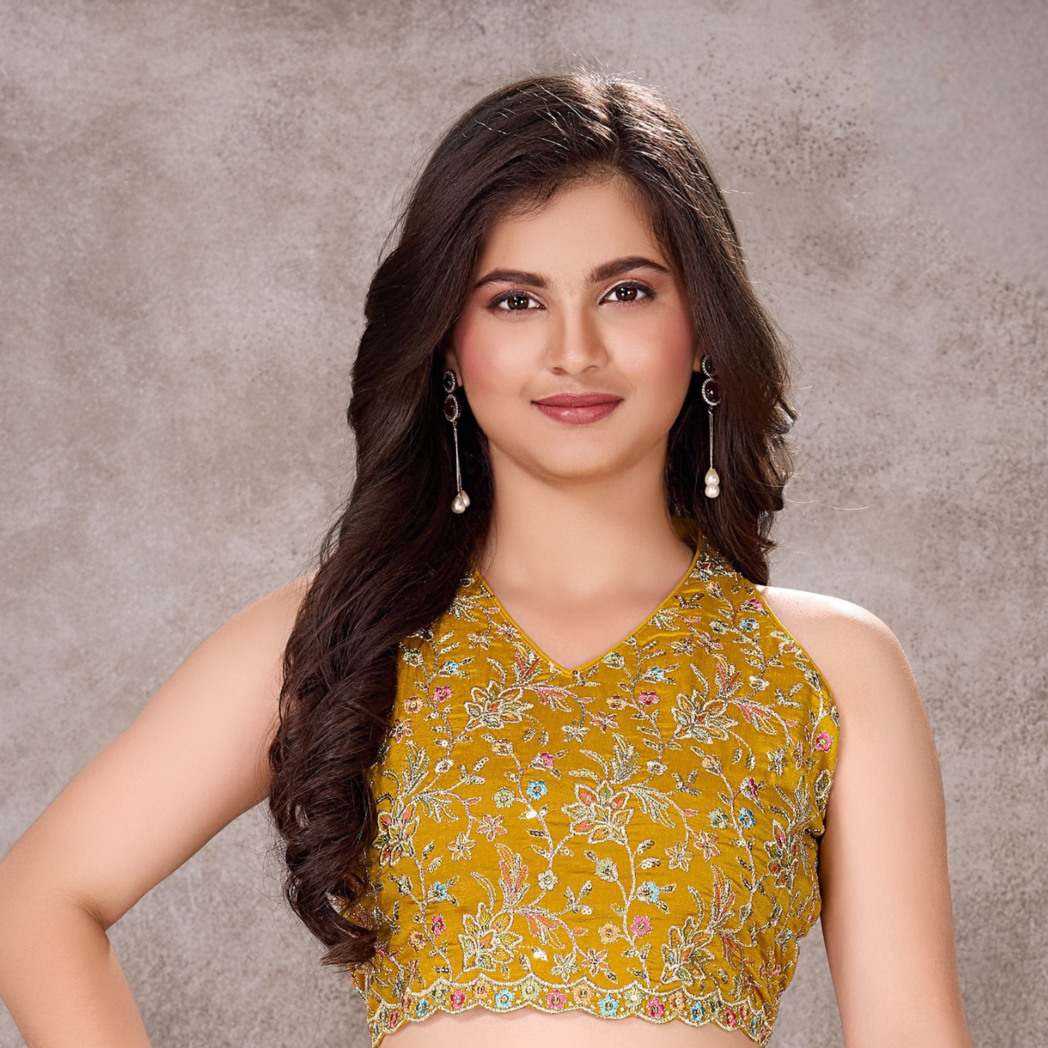 Close-up of ladies yellow embroidered crop top