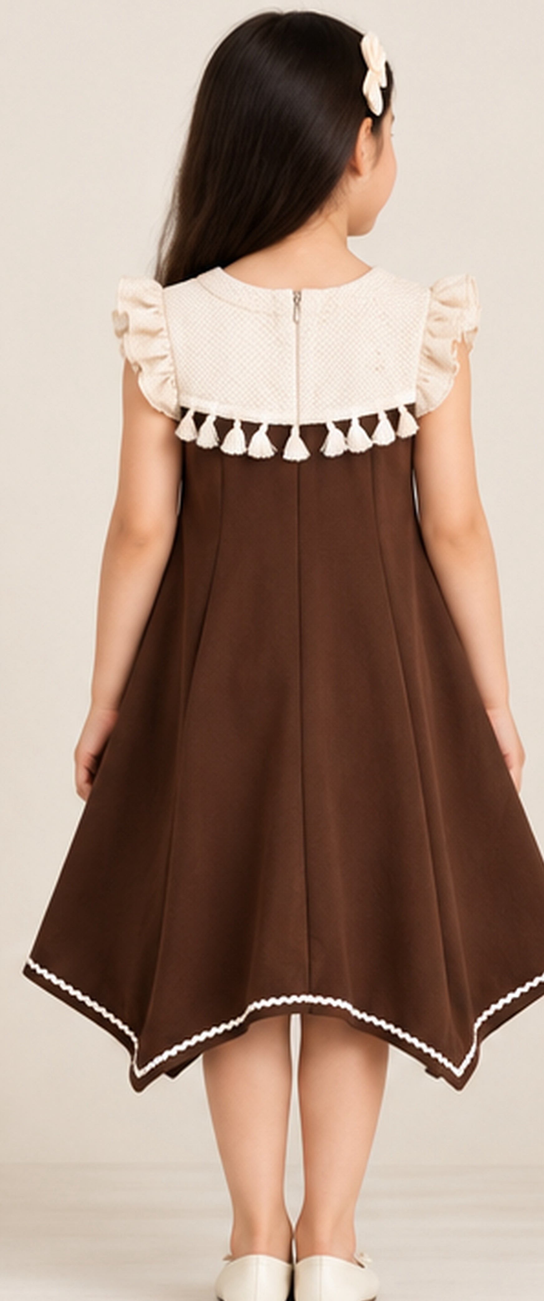 Back view of girls brown A-line dress