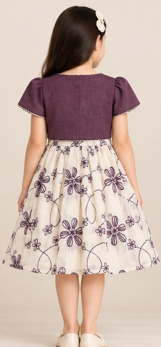 Back view of girls purple floral party dress