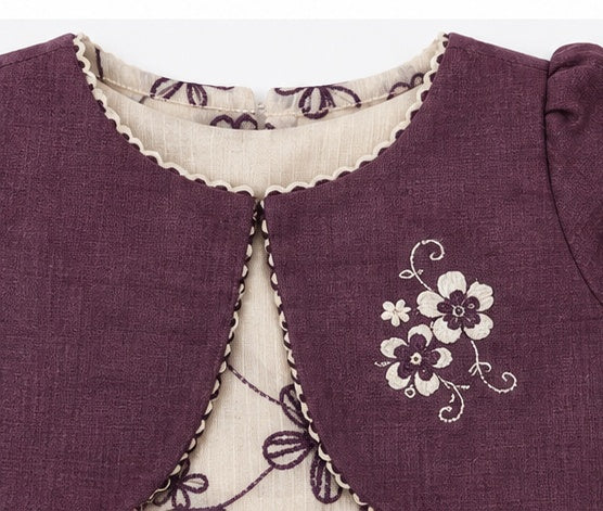 Bodice detail of girls purple party dress