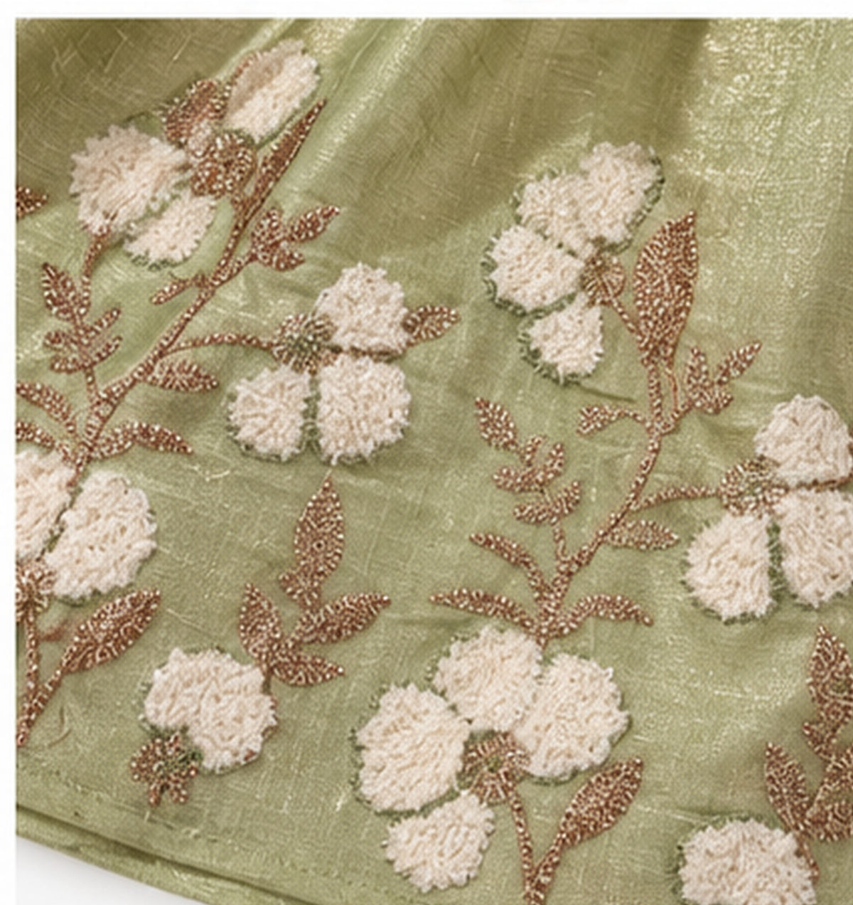Embroidery detail of girls green frock