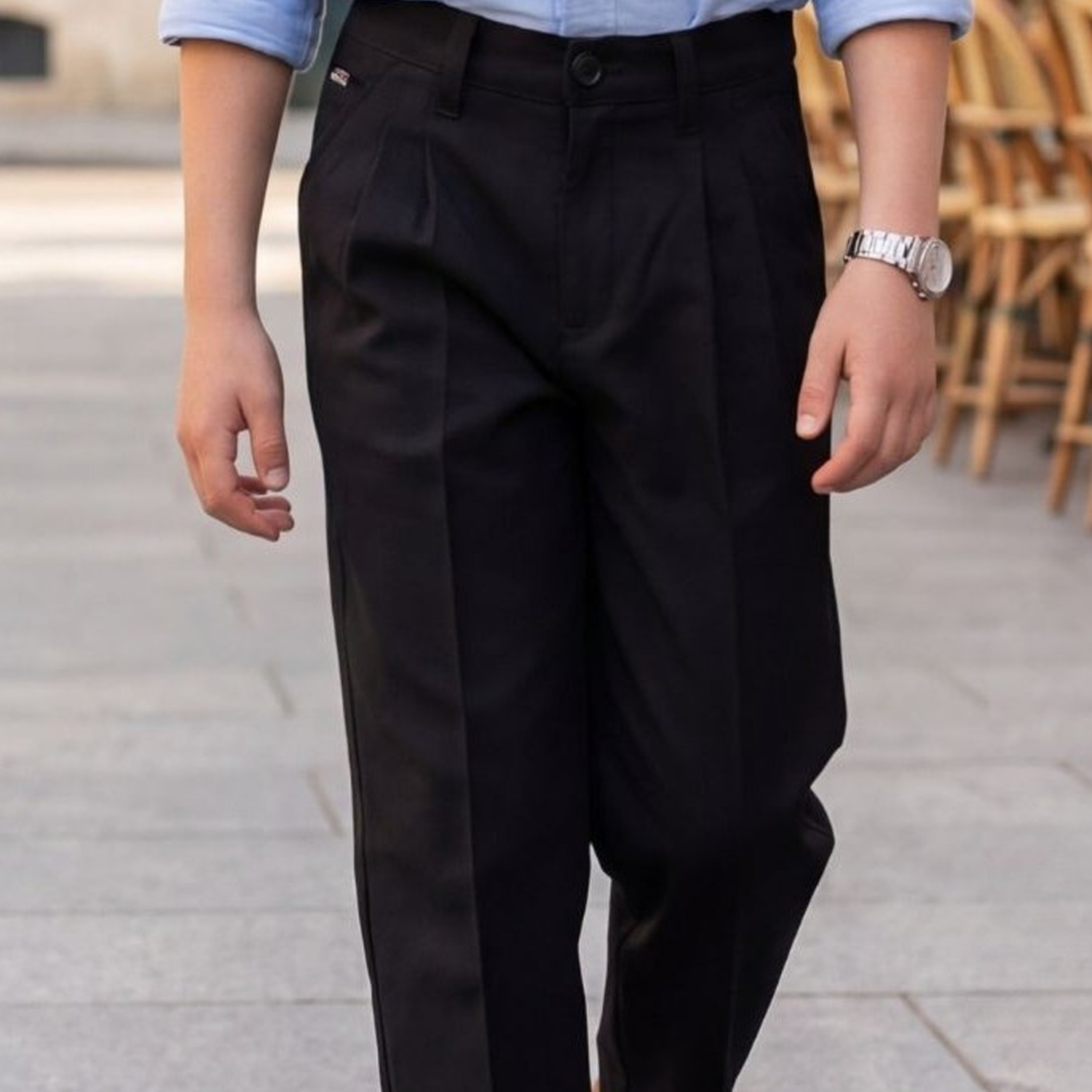 Boys blue shirt with black trousers full view