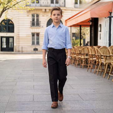 Boys blue shirt with black trousers
